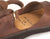 Brown New Mexican handmade leather sandals by Aurora Shoe Co. - insole view on white background.