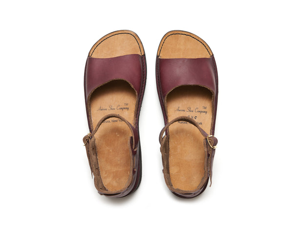 Burgundy New Mexican handmade leather sandals by Aurora Shoe Co. - top down orientation on white background.
